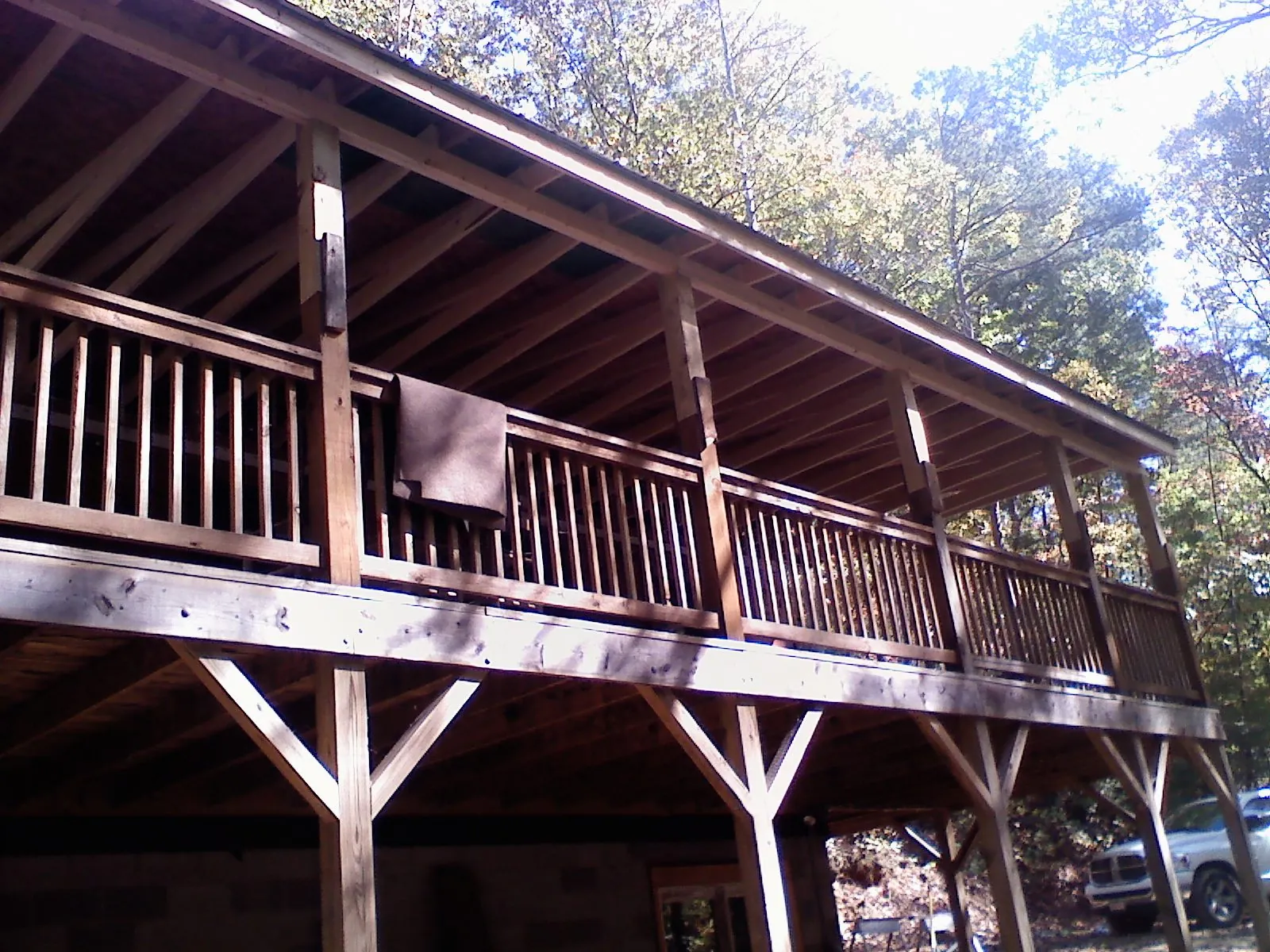 Timber framing under a new elevated porch and deck — Roof Leak Repair in Wood Lake by Roofing Brothers